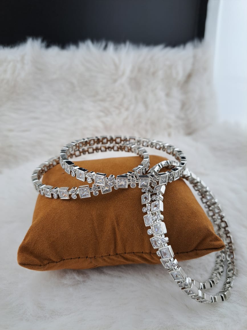 Real cubic zircon rhodium bangles