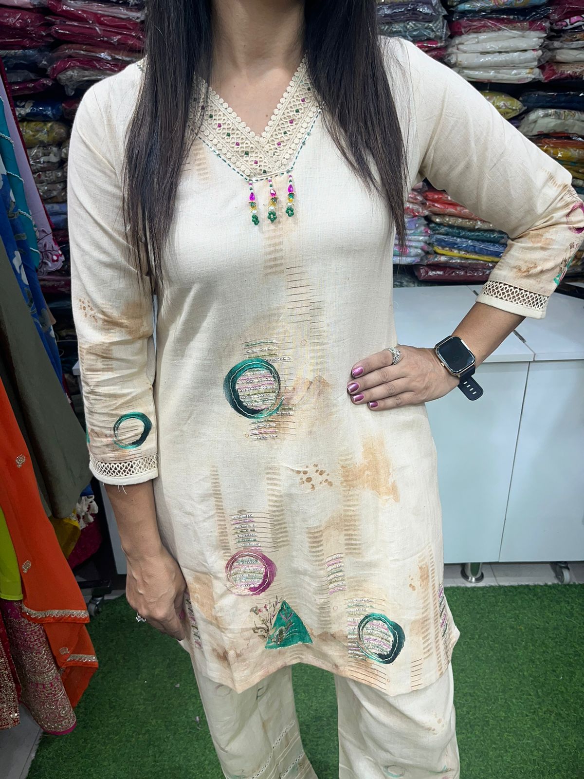 Minimalist boho co-ord set in light beige with thread detailing .