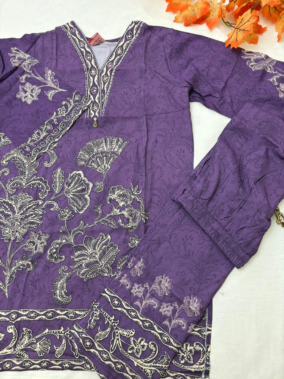 Rich purple co-ord set with digital prints in black.