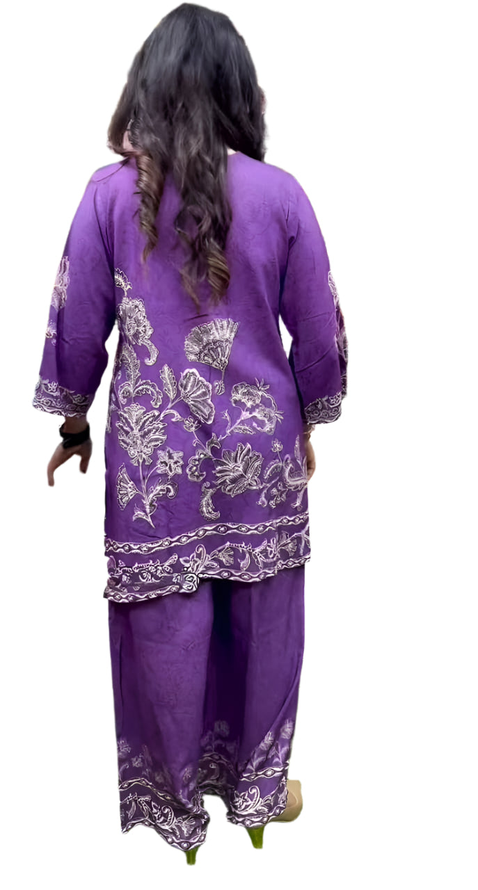 Rich purple co-ord set with digital prints in black.