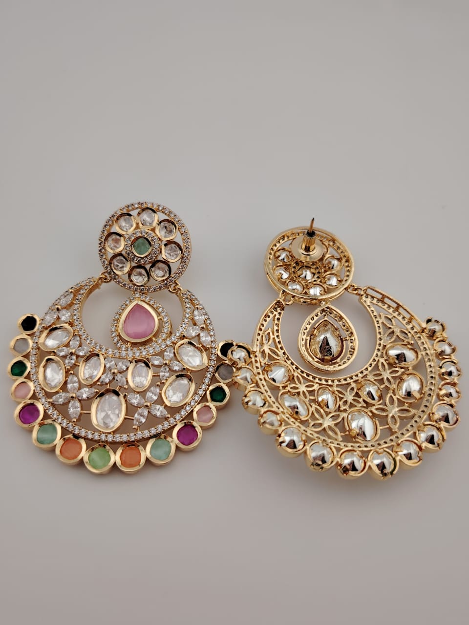 Statement kundan chandbaali with pota stones.
