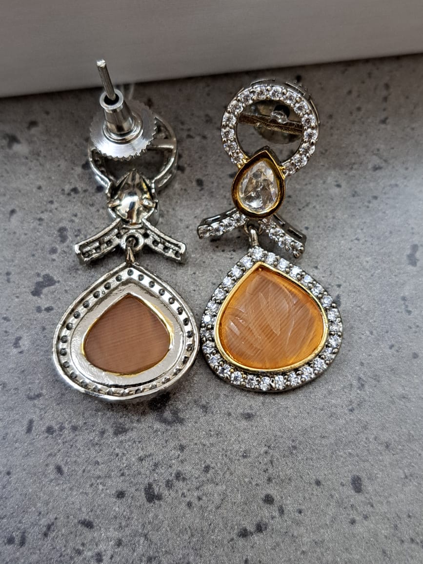 Peach color carved stone earrings with AD and kundan