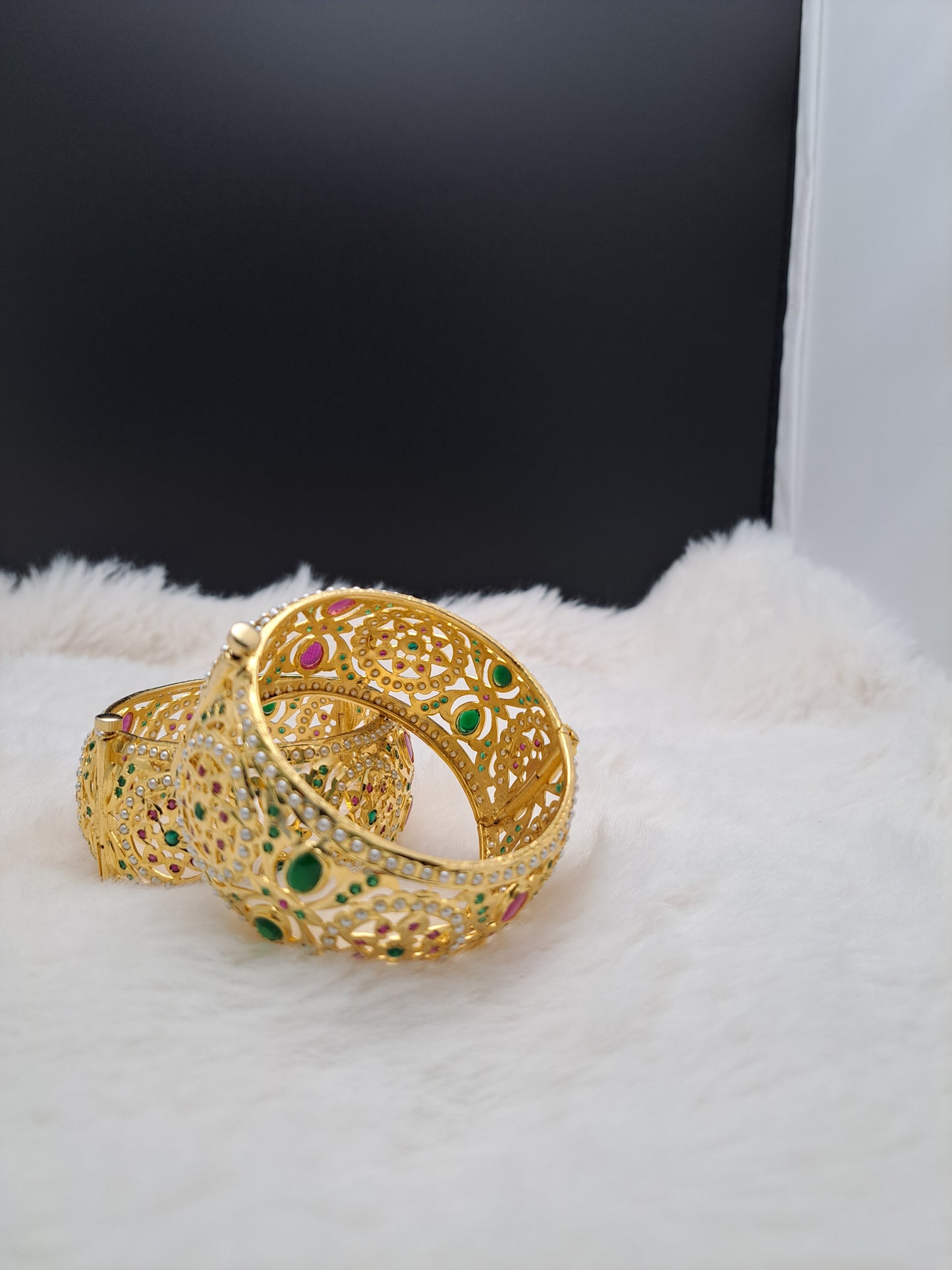 Hyderabadi broad kada with ruby and emerald stones and pearls