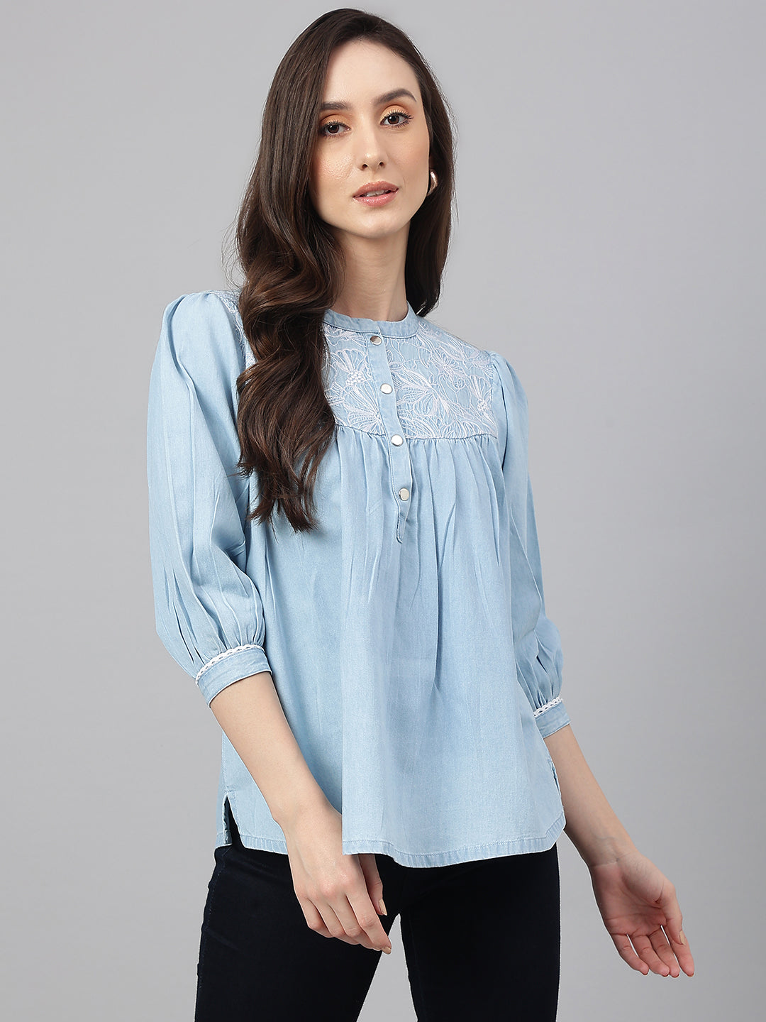 Denim tunic top with embroidered yolk in light blue color