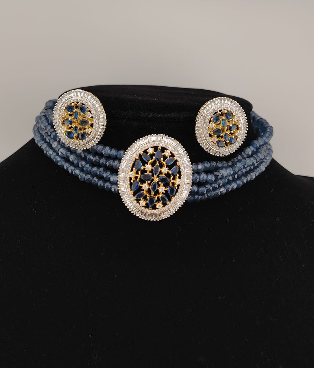 Blue hydrobeads choker with blue and white zircon stones.