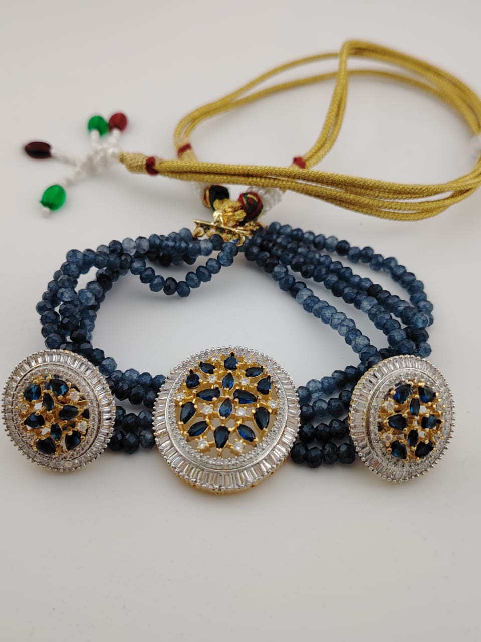 Blue hydrobeads choker with blue and white zircon stones.