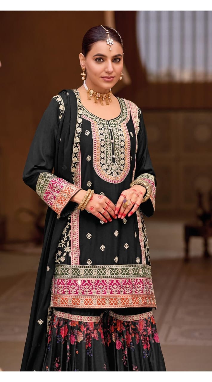 Black color sharara set with digital prints and aari embroidery.