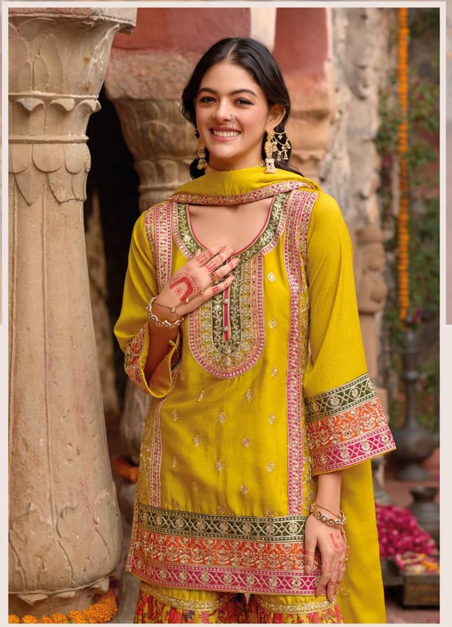 Mustard yellow sharara set with digital prints and aari embroidery.