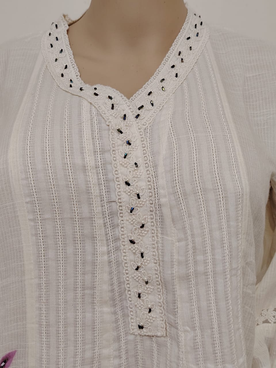 Off-white kora cotton short kurti and pant set with brush paint and dyed dupatta.