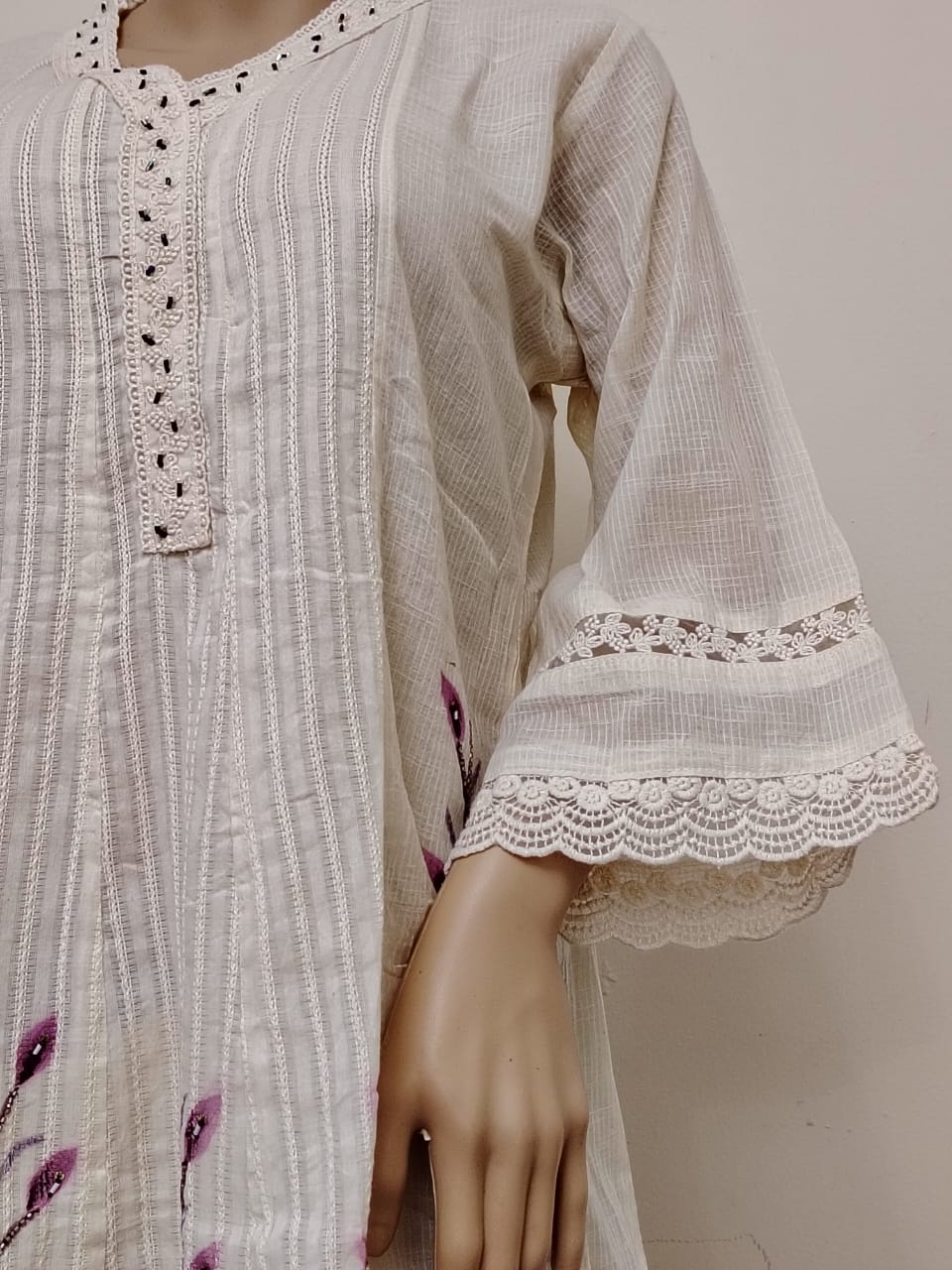 Off-white kora cotton short kurti and pant set with brush paint and dyed dupatta.