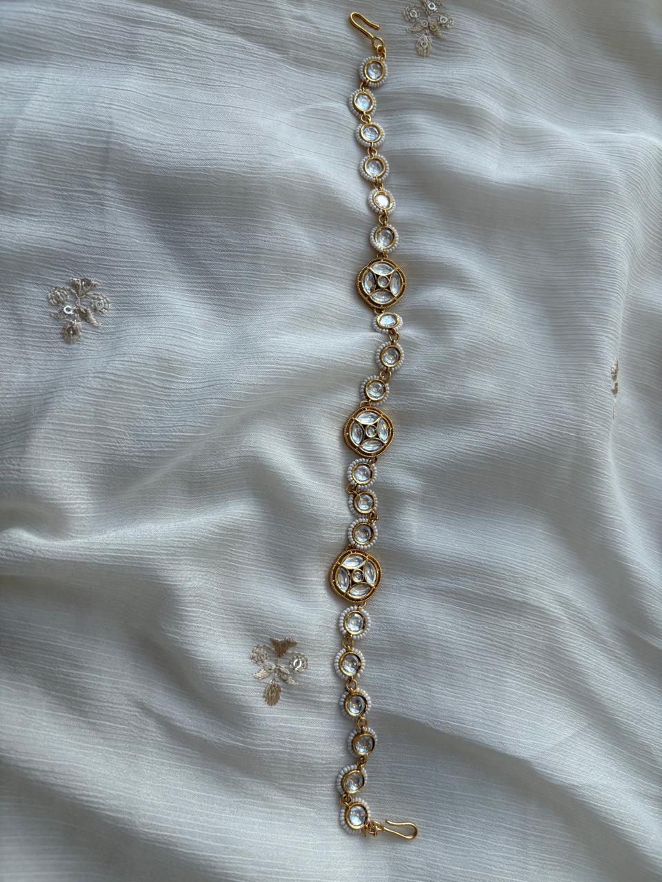 Sheesh phool (hair accessory) with kundans and pearls