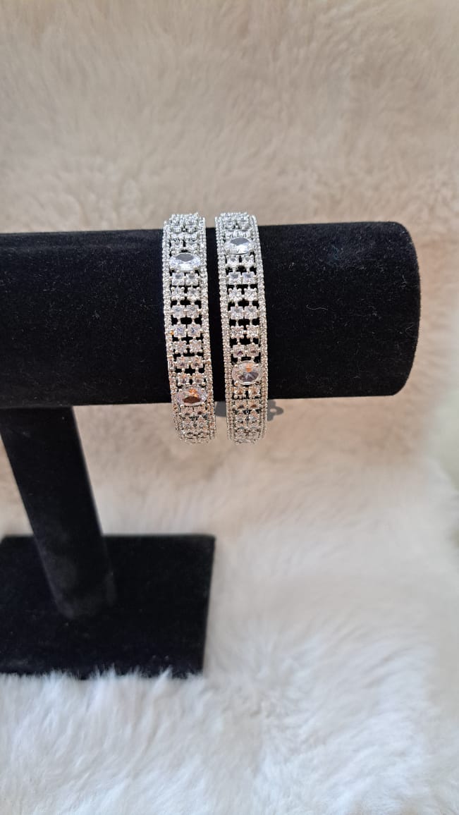 Gorgeous American diamonds and cubic zircon silver bangles.