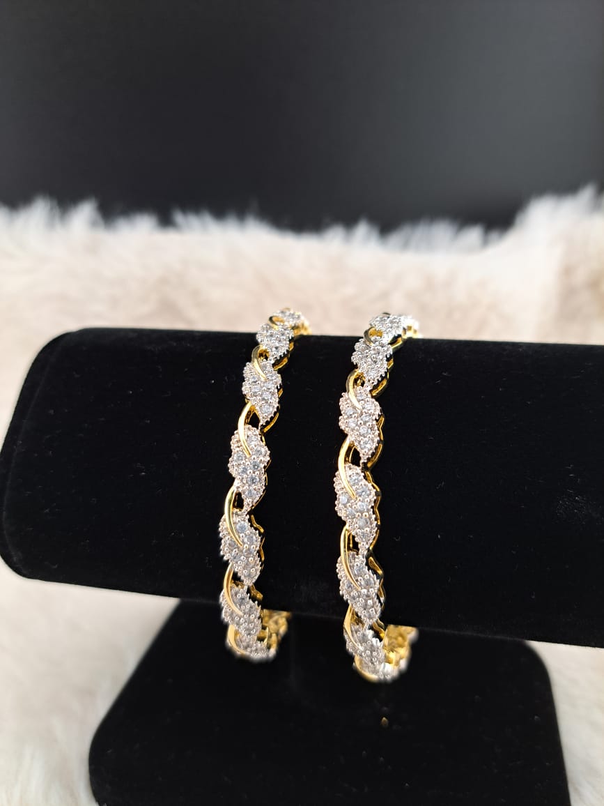 Cubic zircon leaf designed bangles.