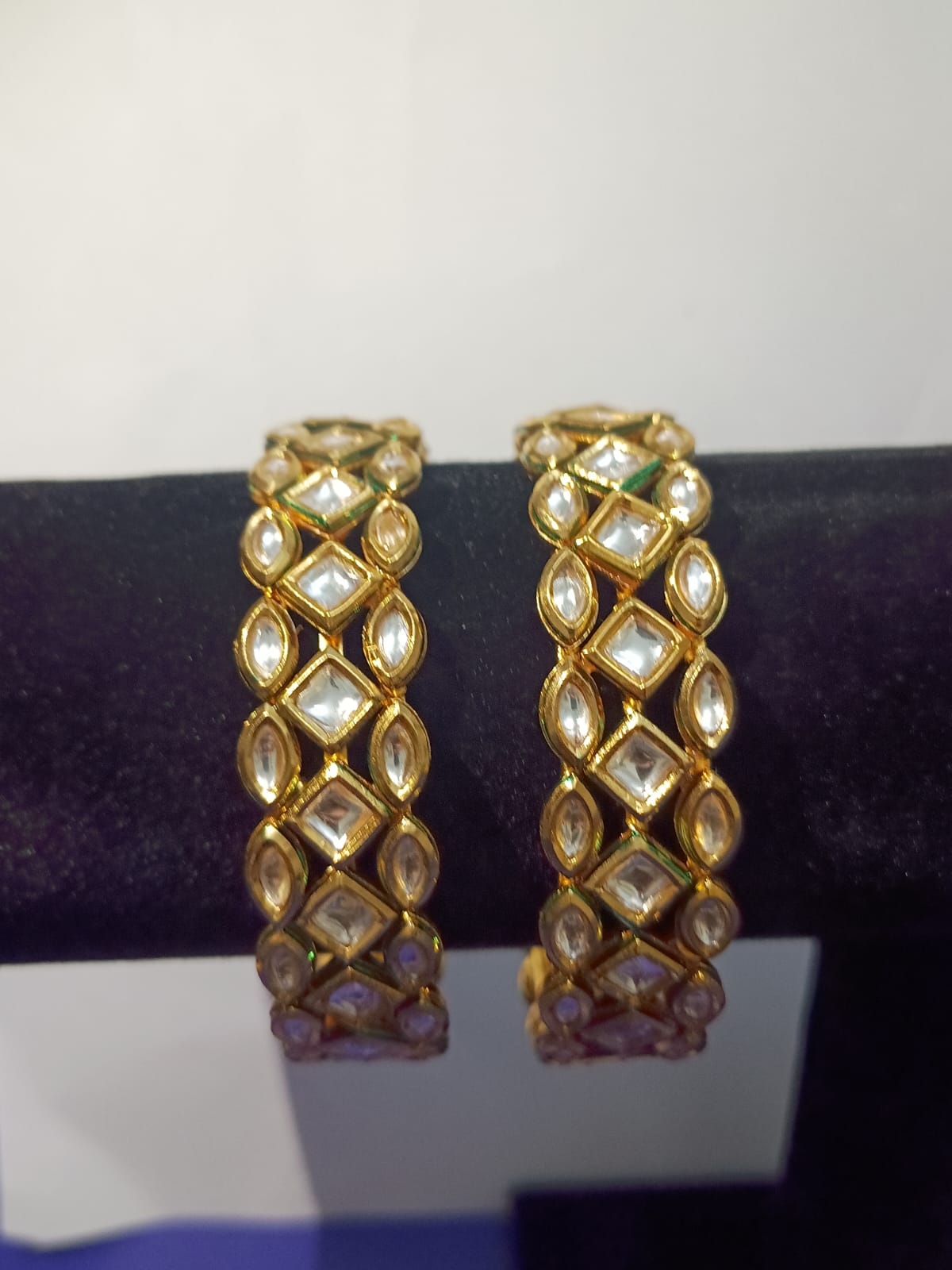 Premium kundan broad bangles.