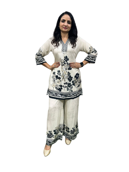 Pure muslin co-ord set with digital prints in ivory white and black.