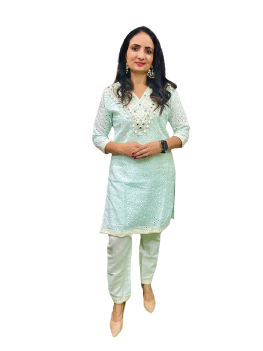 Elegant schiffli embroidered co-ord set with mirror work.