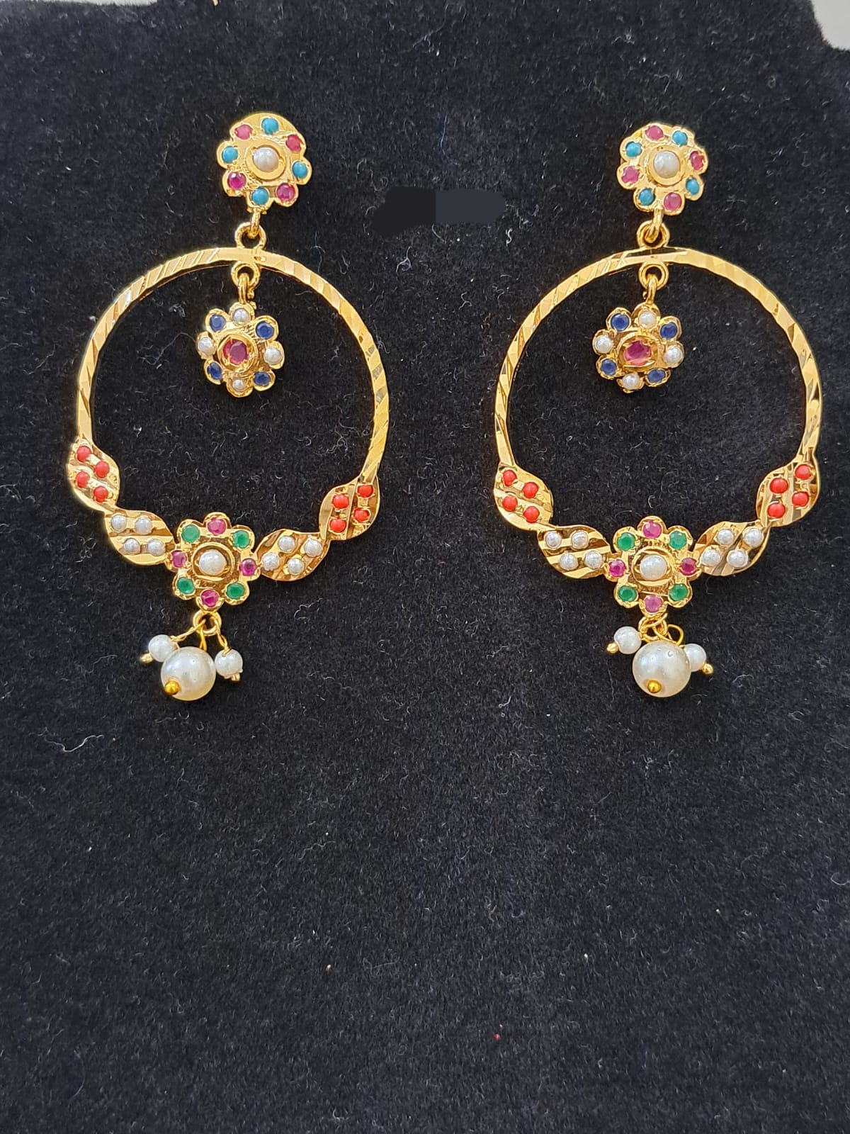 Chand bali ring type with navrathan(multicolor) stones and pearls.