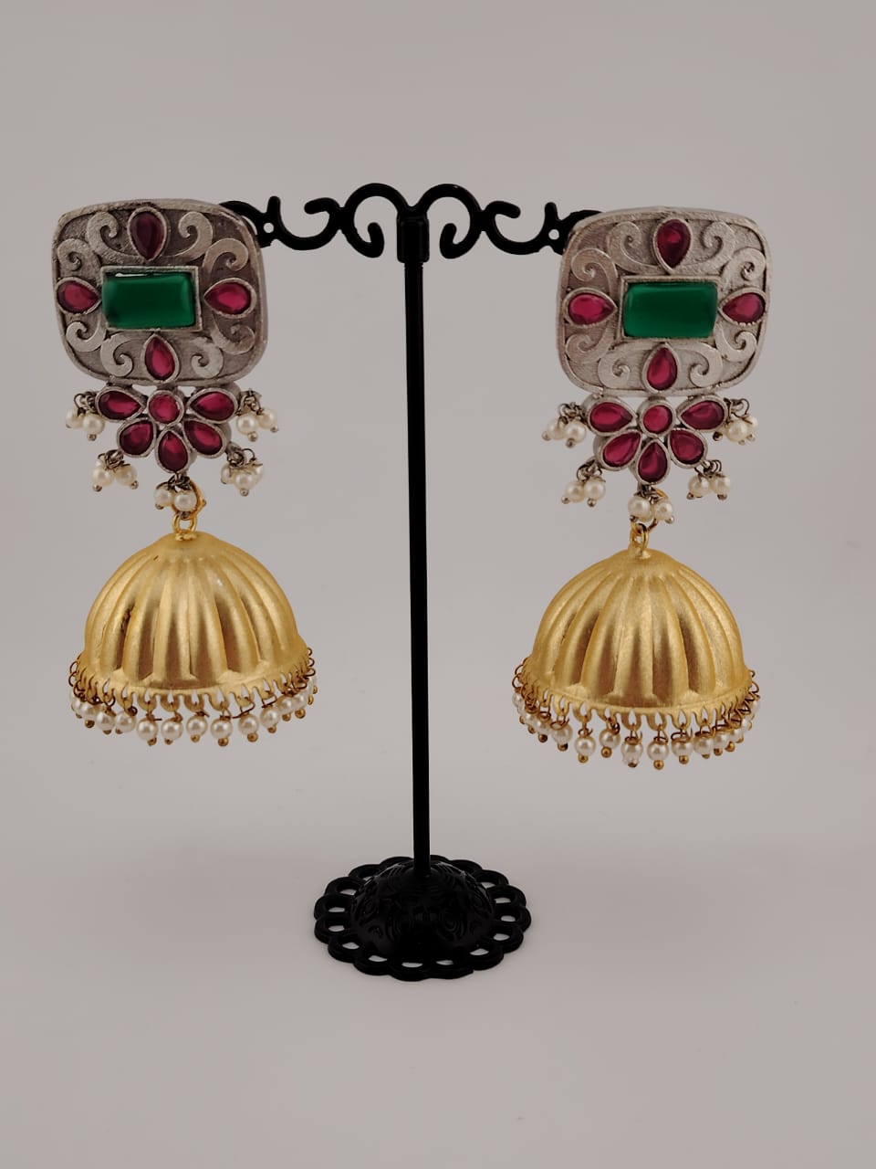 Two tone jhumkas with ruby and emerald