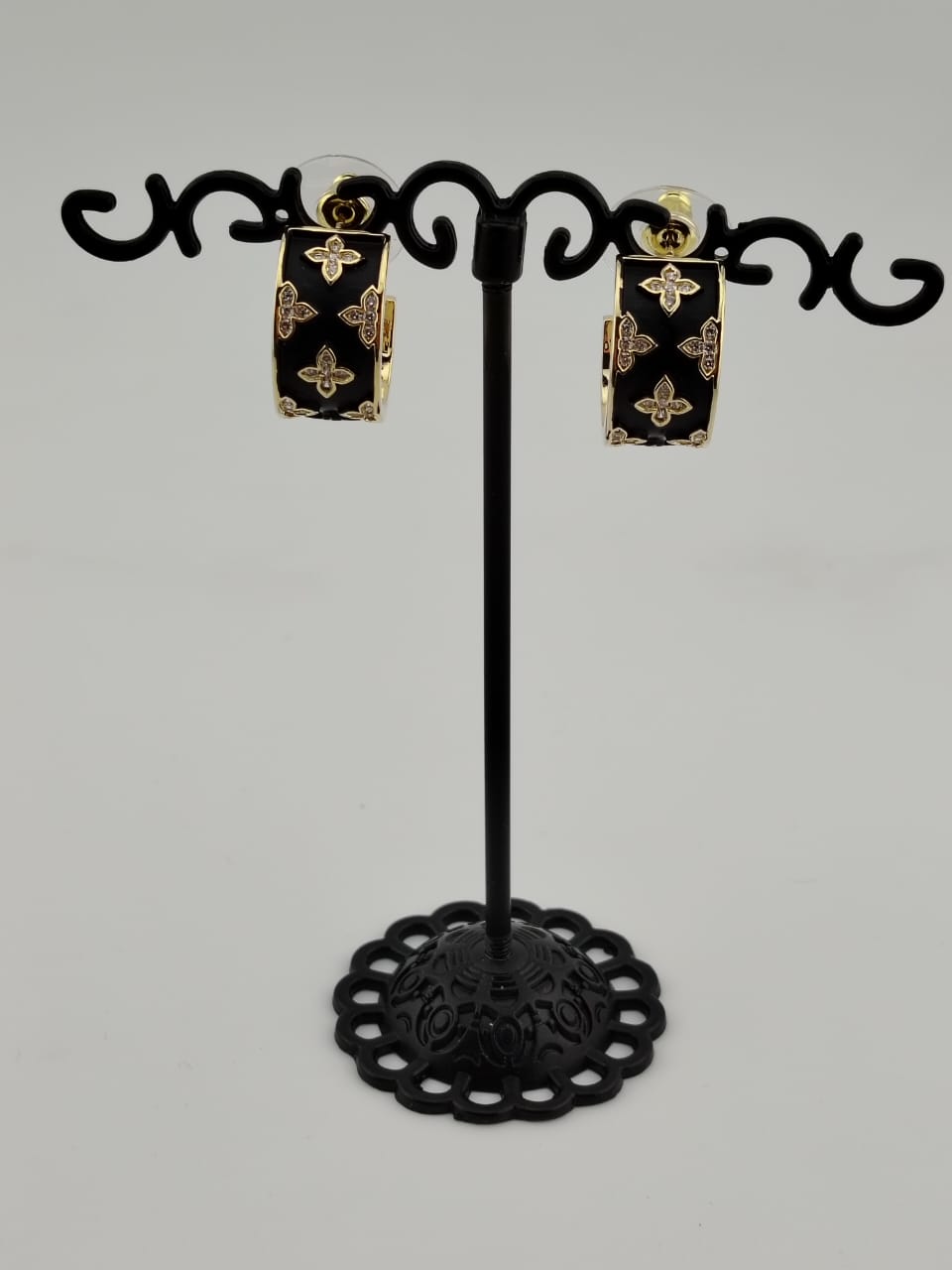 Half ring earring with black enamel and american diamonds