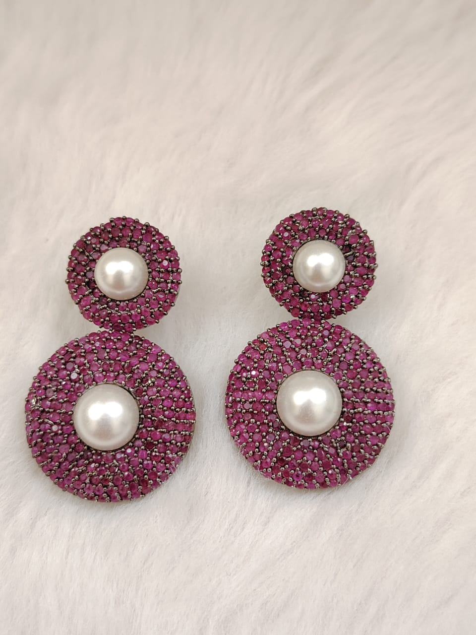 Sabyasachi inspired earring studded with  pink stones and pearls