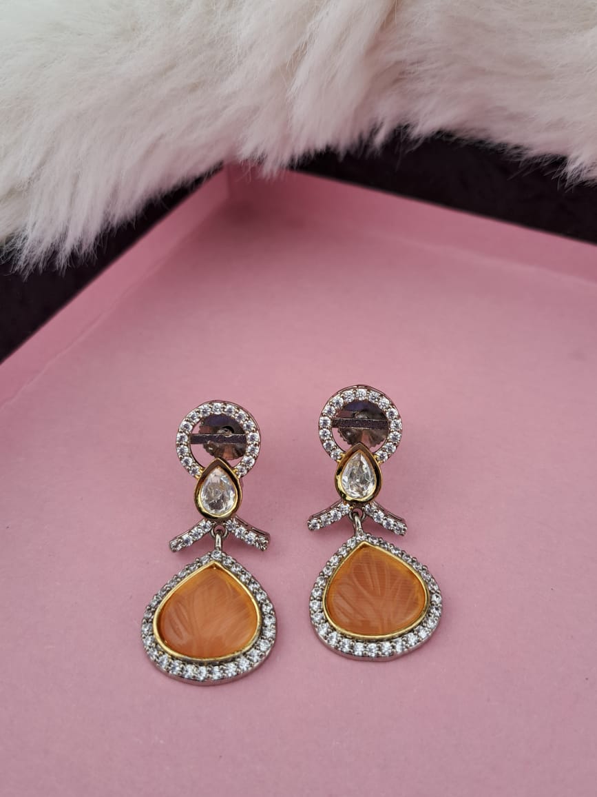 Peach color carved  stone earrings with AD and kundan
