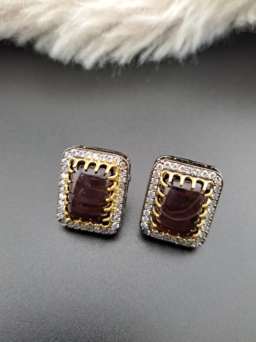 Monalisa(dark shade)stone studs with american diamonds