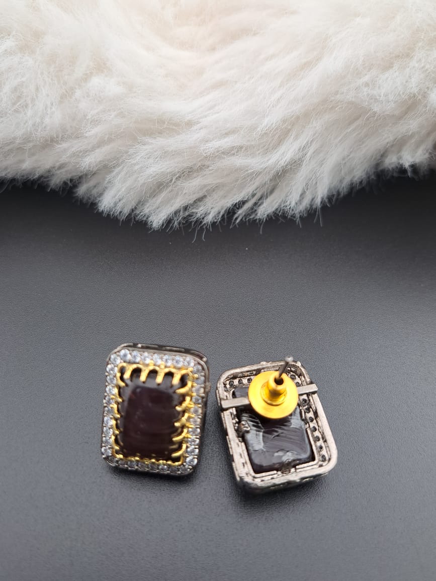 Monalisa(dark shade)stone studs with american diamonds