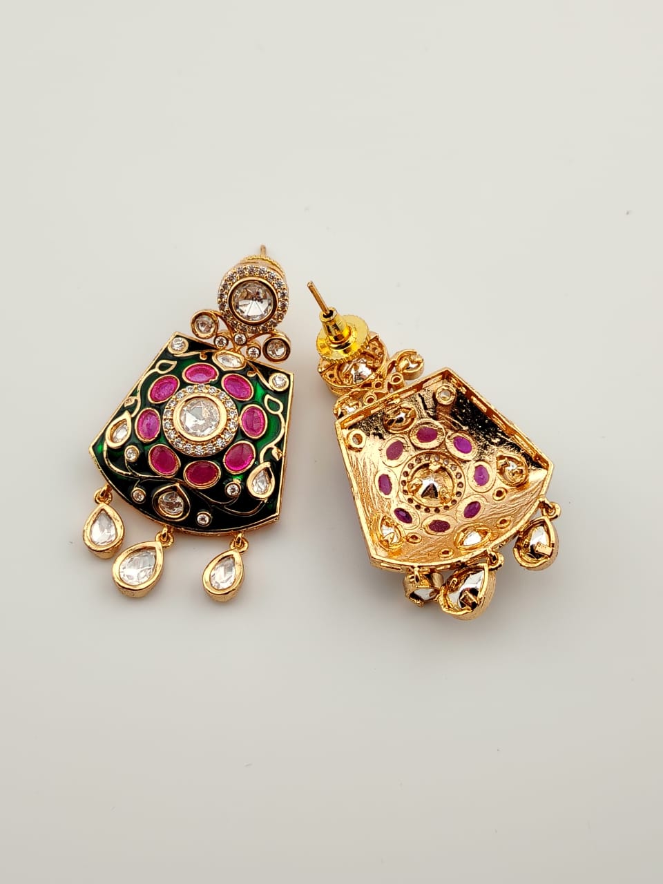 Kundan earrings with green meenakari and kemp stones