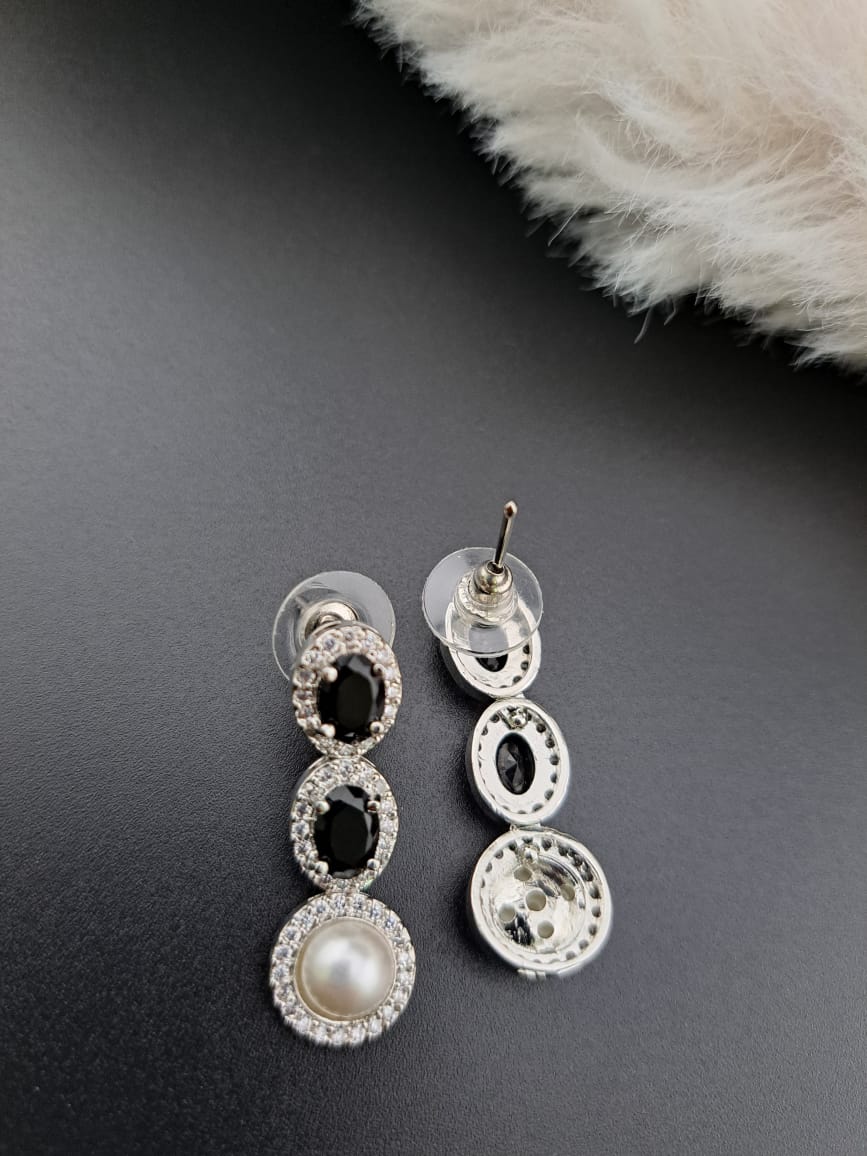 Black cubic zircon earrings with American diamonds and pearl.