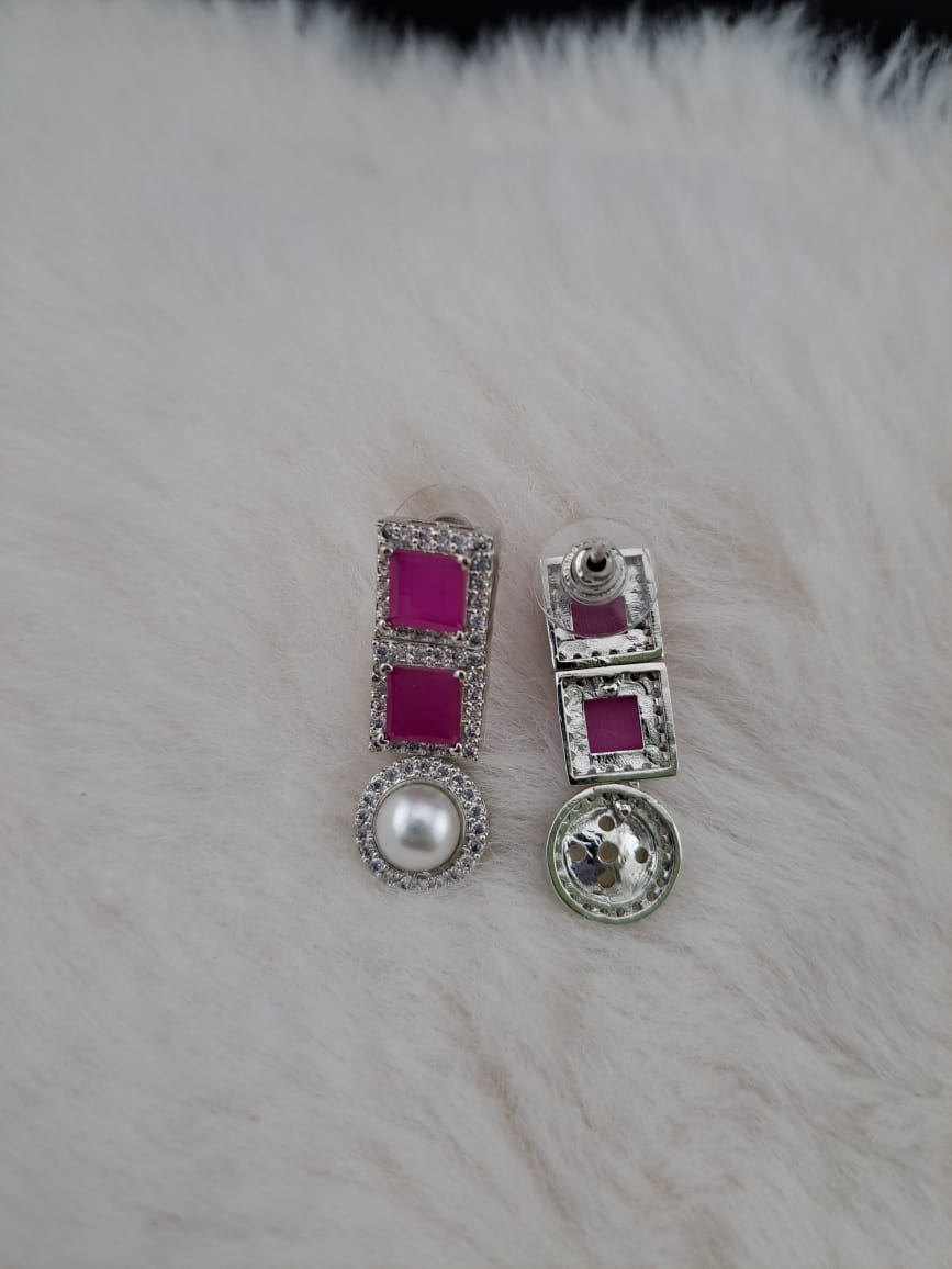 Hot pink cubic zircon earrings with american diamonds and pearl.