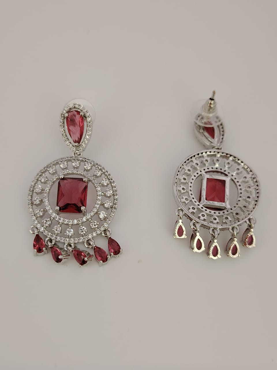 Silver tone statement earring with red and white CZ stones