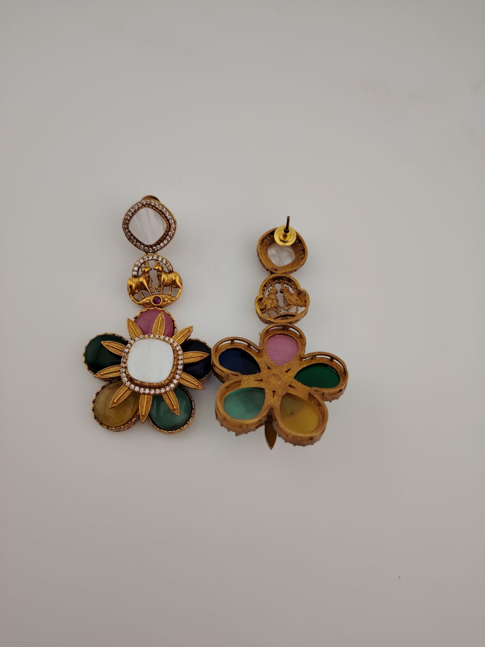 Sabyasachi inspired danglings with mother of pearls.