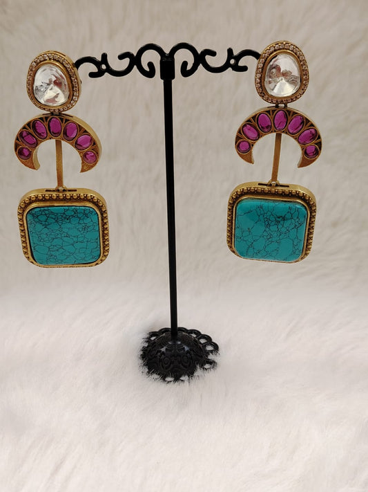 Sabyasaachi inspired kundan danglers with turquoise doublet and kemp stones