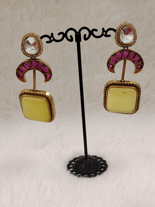 Sabyasaachi inspired kundan danglers with yellow doublet and kemp stones