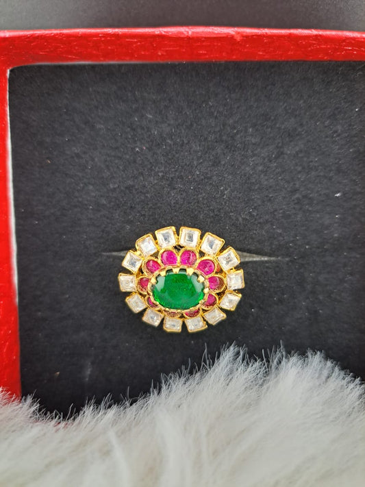 Pachi kundan finger ring with pink kemp stones and emerald in center