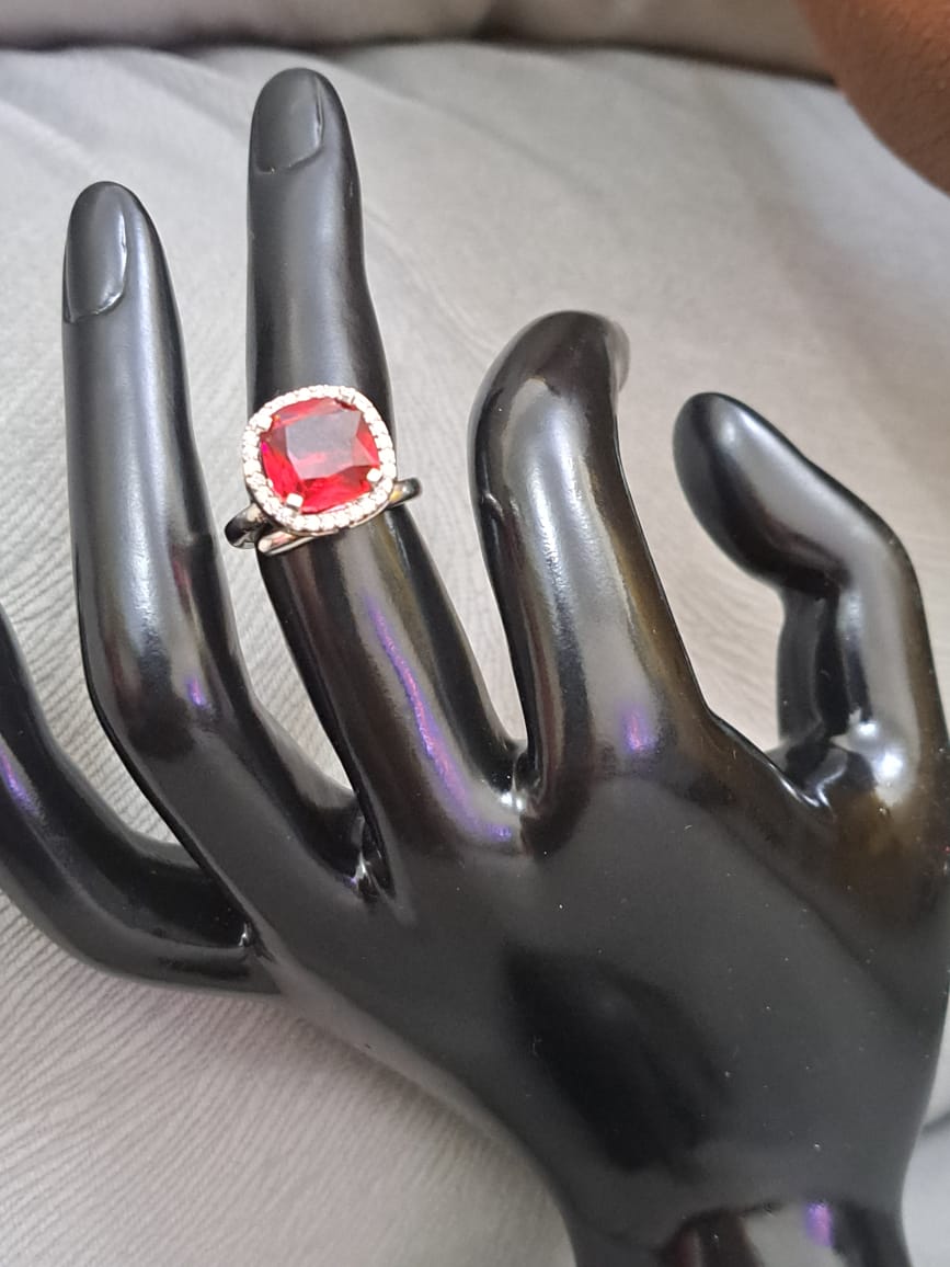 Silver finger ring with ruby and american diamonds