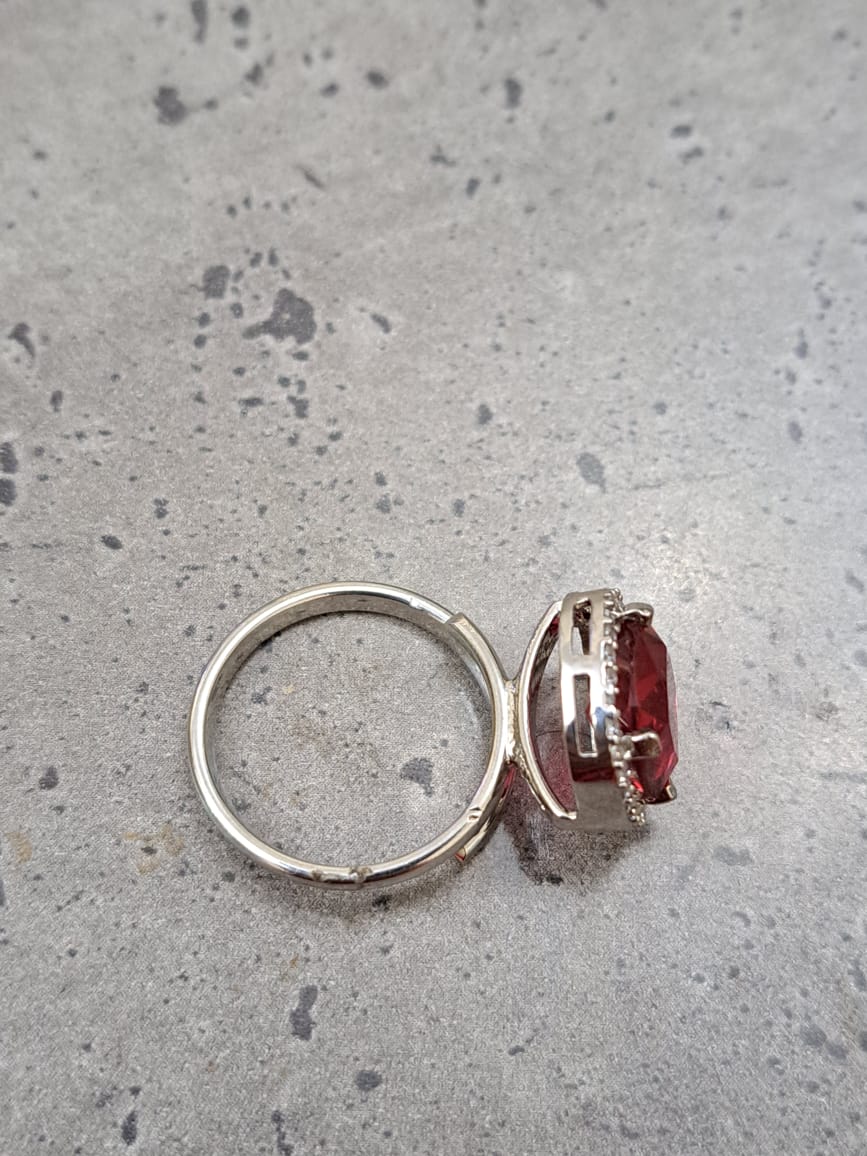 Silver finger ring with ruby and american diamonds