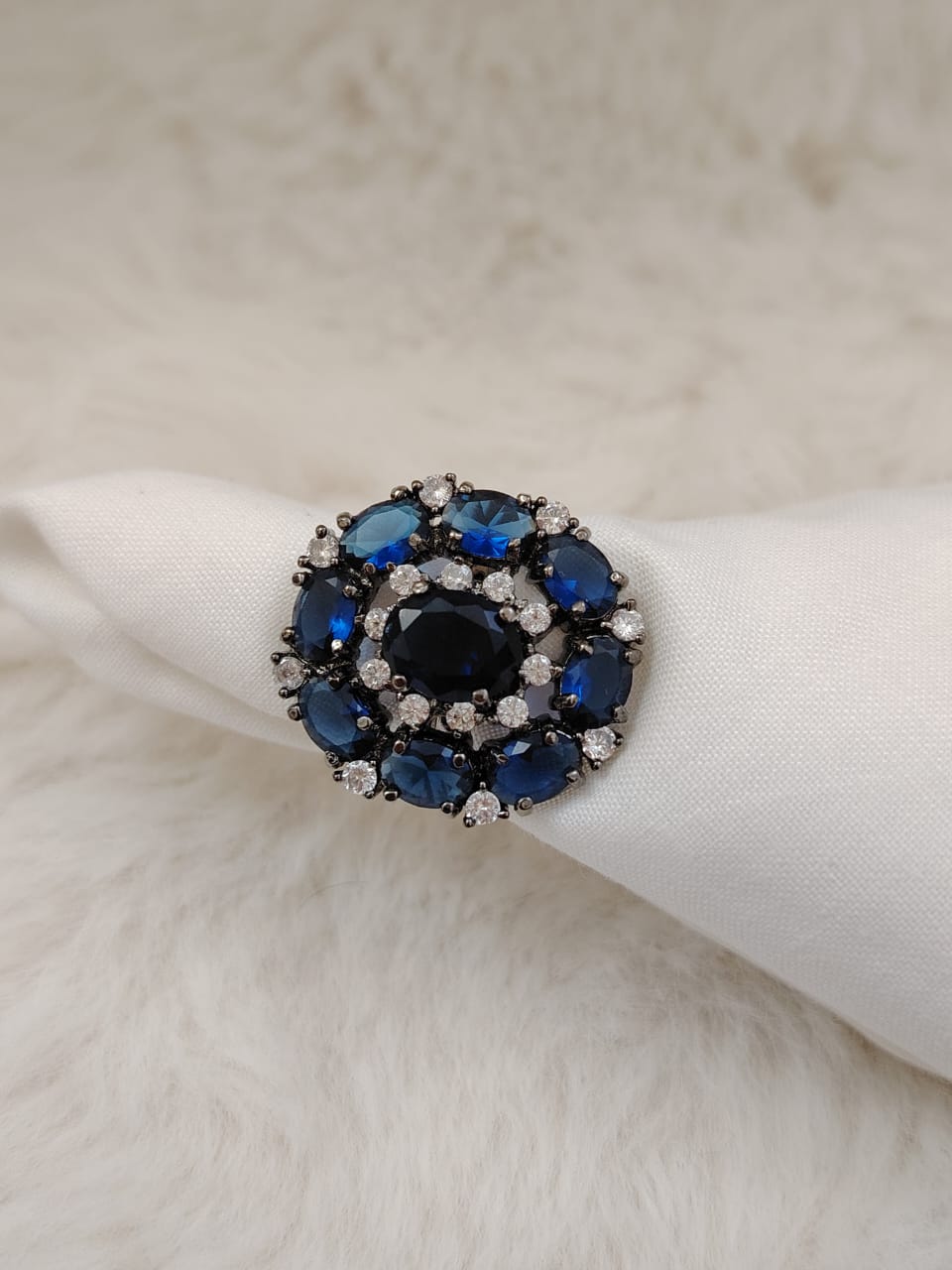 German silver oxidized finger ring with navy blue and white zircons