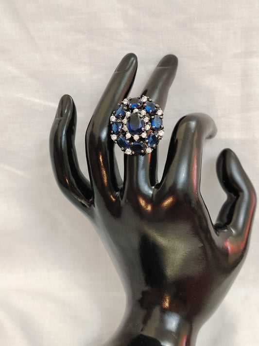 German silver oxidized finger ring with  navy blue and white zircons