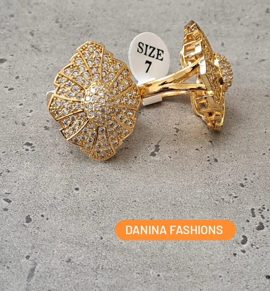 Flower shaped gold finger ring with CZ stones