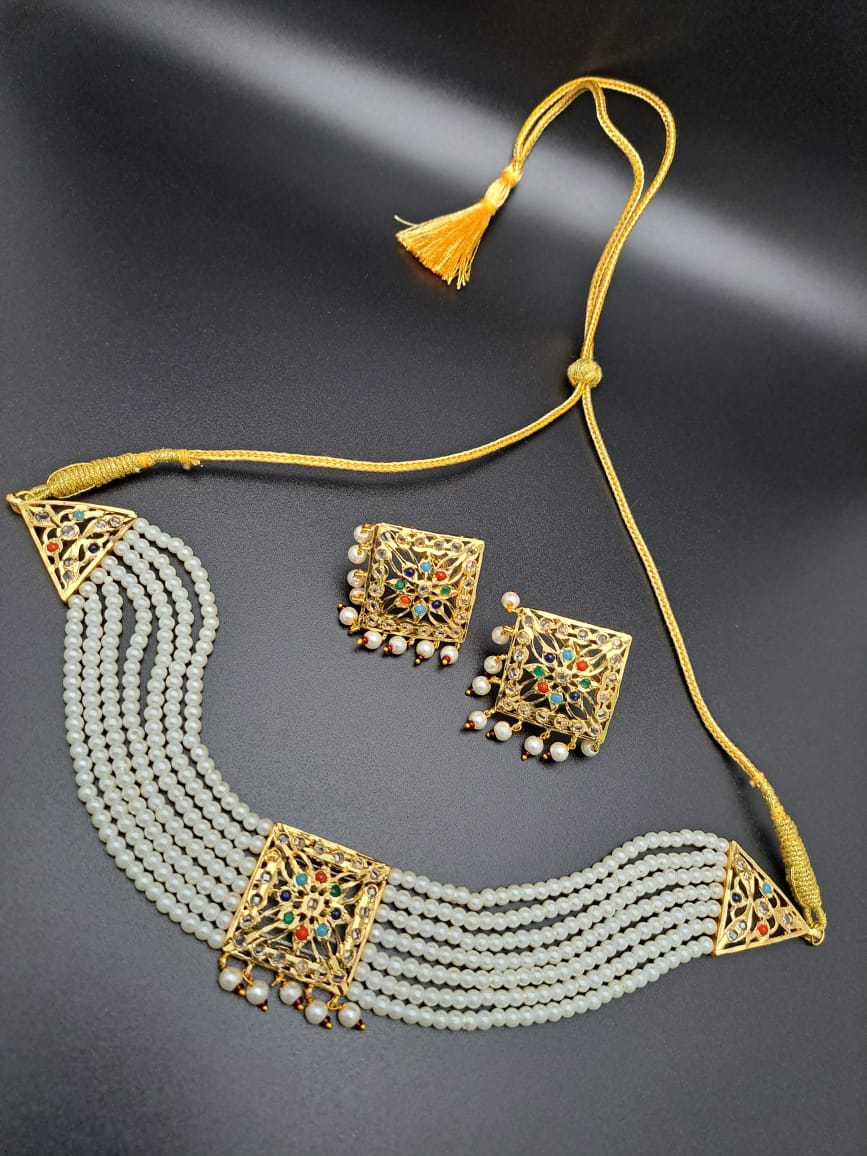Hyderabadi choker set with pearls and navrathan (multi color)stones
