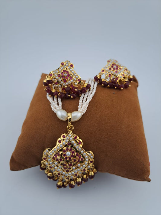 Hyderabadi pearl mala set with ruby pendant and studs 