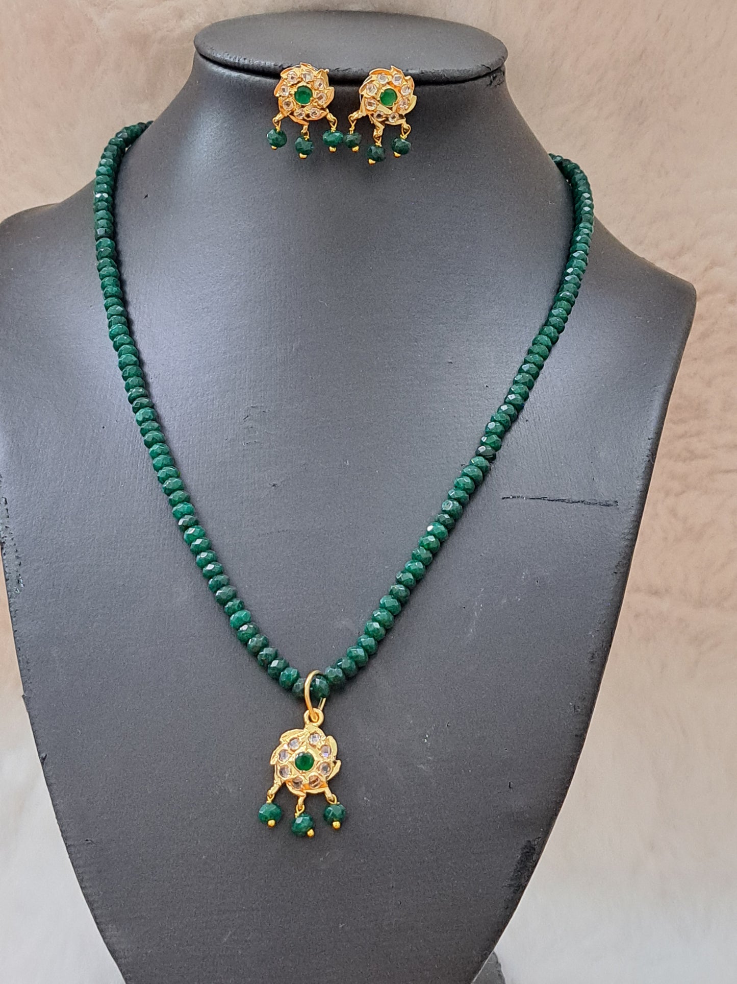 Real onyx beads set  with emerald and polki kundans.