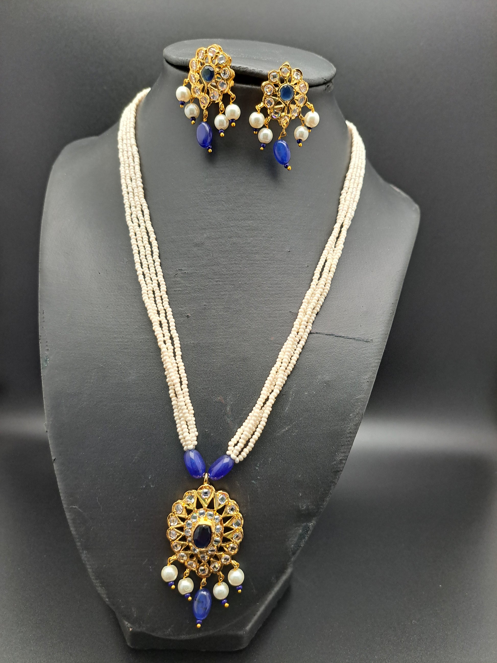 Semi-precious mini pearls mala set with uncut polki ,blue sapphire,and awaze