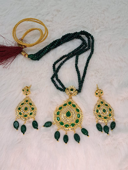 Hyderabadi pure onyx beads set with polki and emerald stones