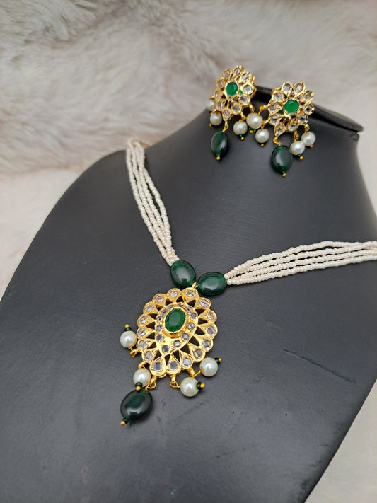 Semi-precious mini pearls mala set with uncut polki,emeralds and green awaze stones.