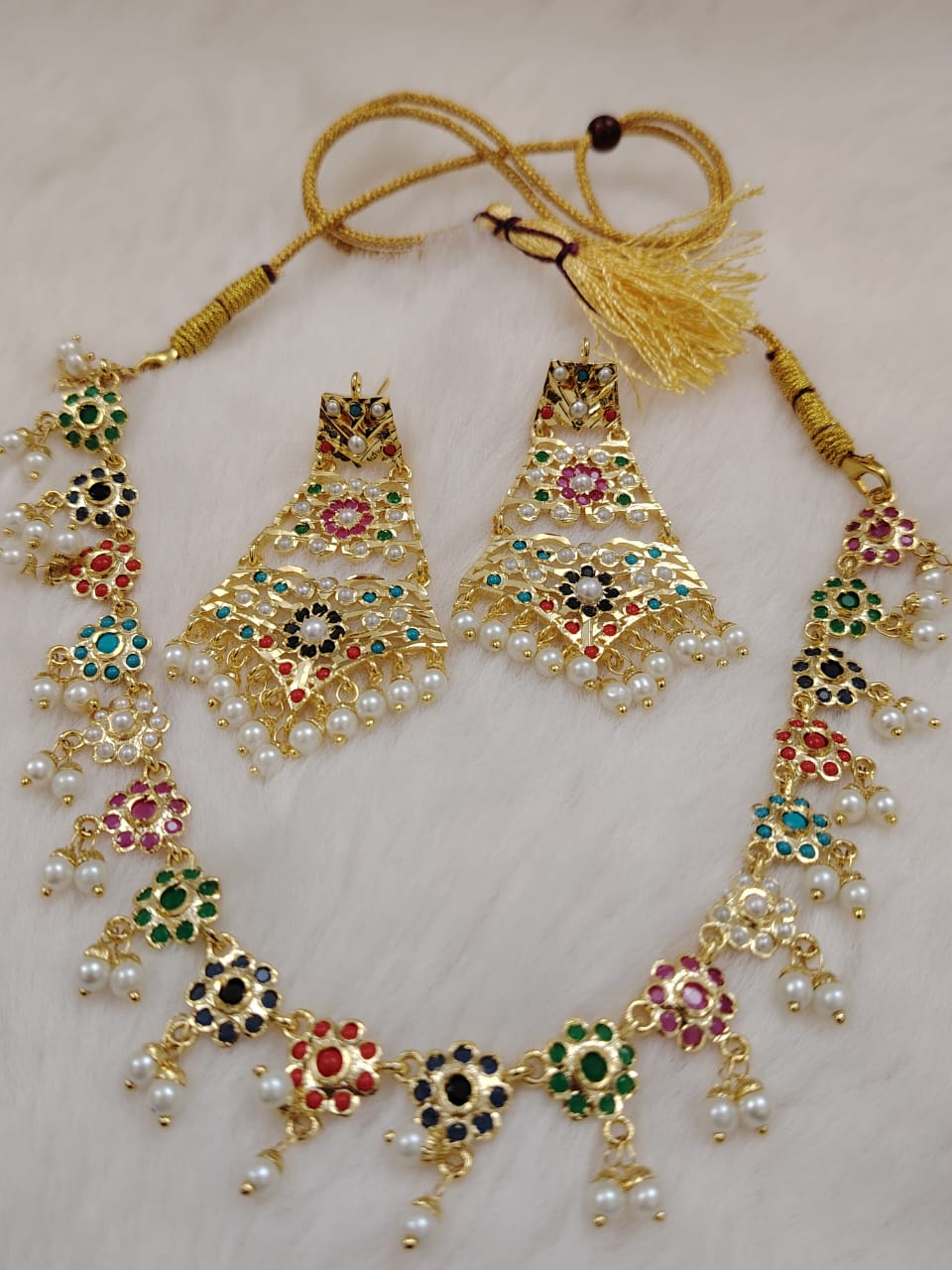 Handmade neckfit pearl choker set with navratan(multicolor)gemstones