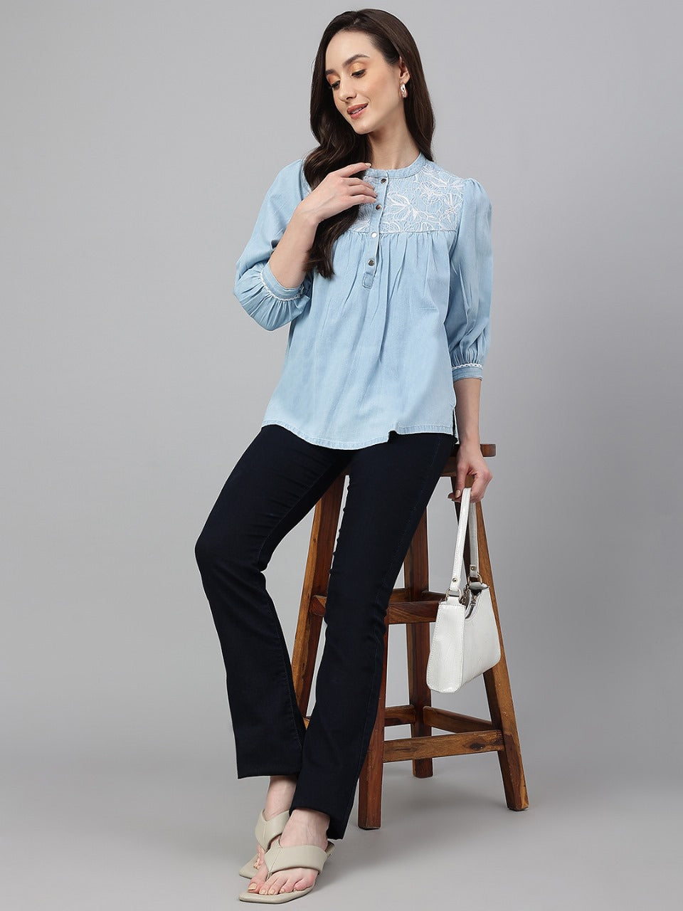 Denim tunic top with embroidered yolk in light blue color