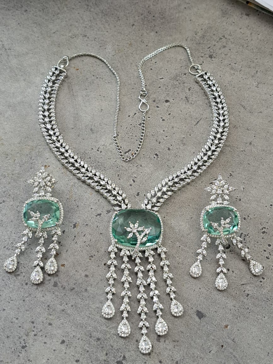 Cubic zircon set with mint duplet stone and american diamonds