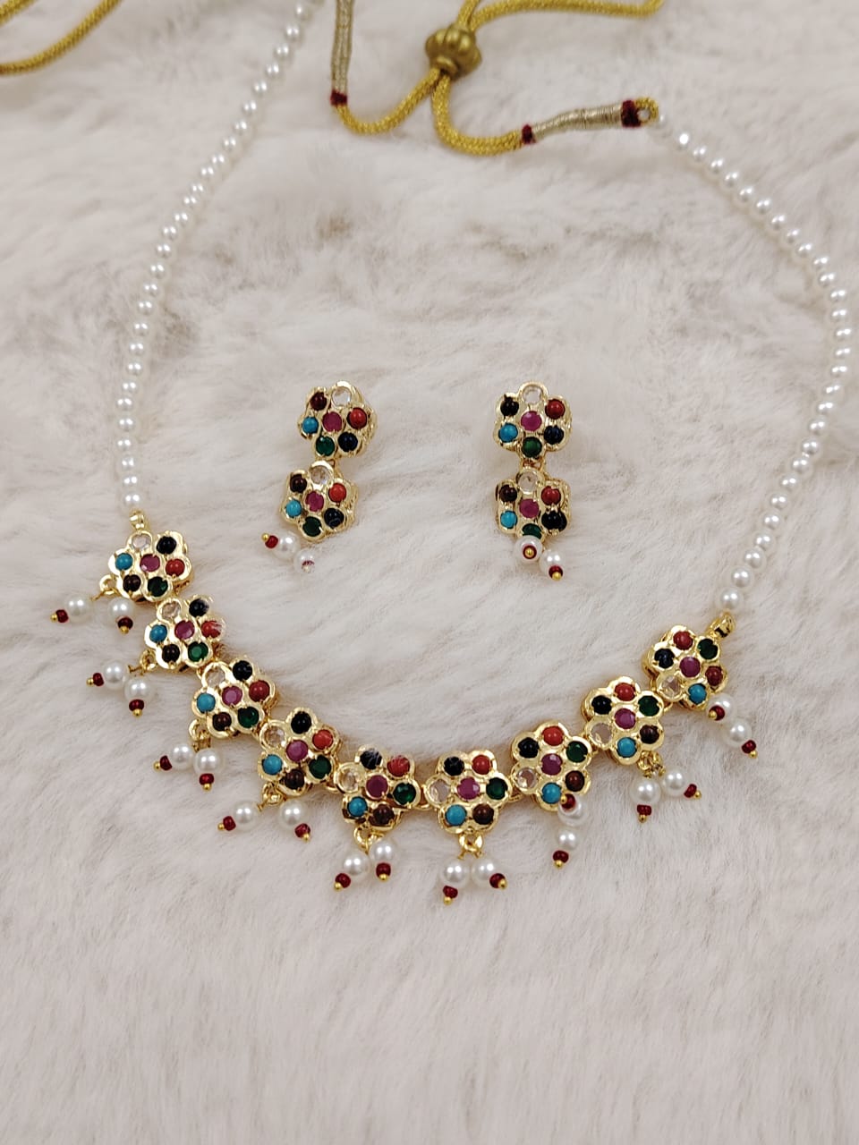 Semi-precious pearl set with navratan (multicolor)gemstones